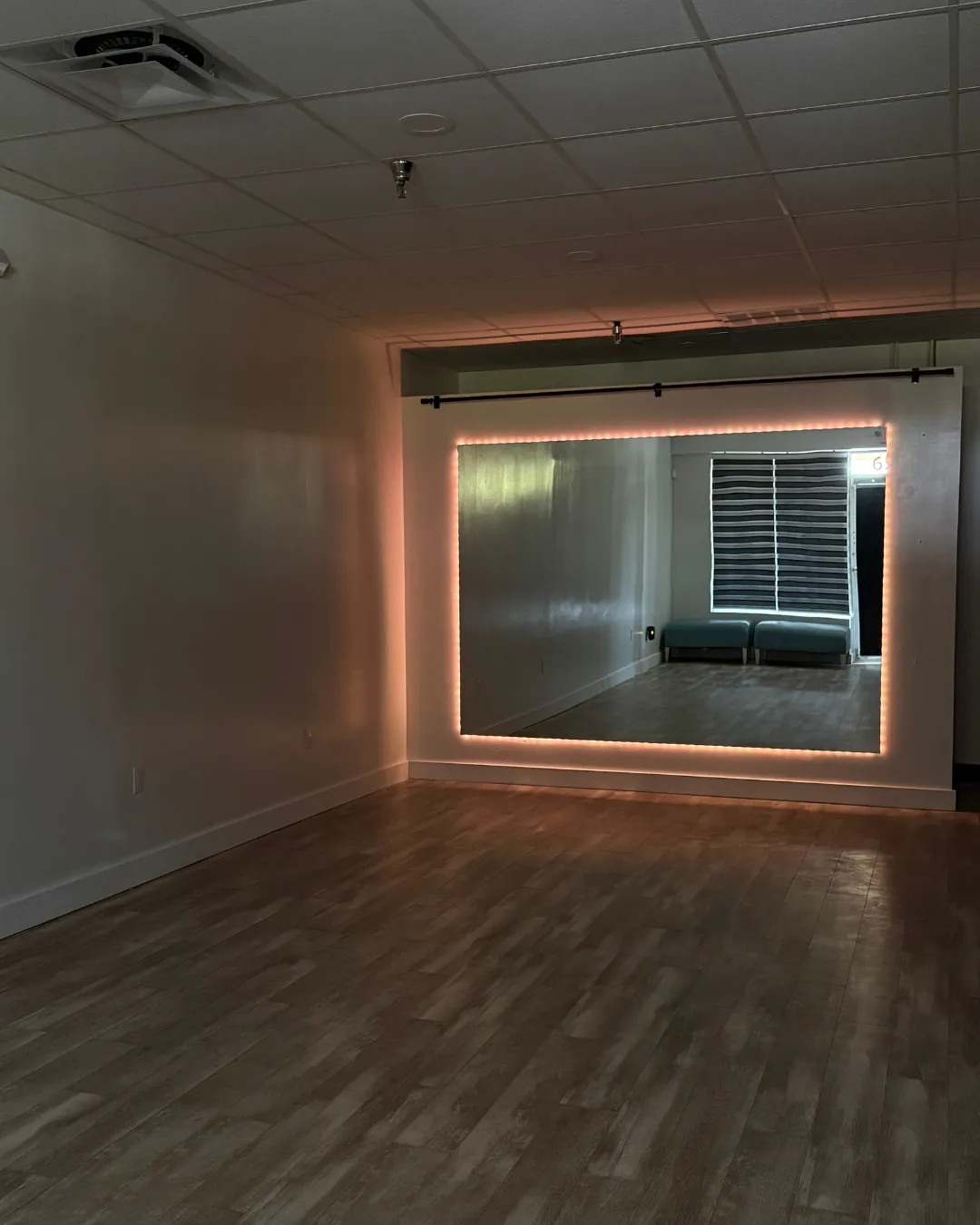 Open floor with mirrored wall
